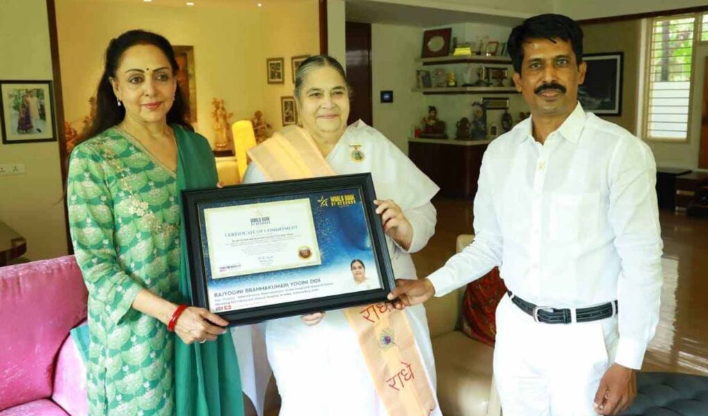 Honourable Hema Malini bestows the certificate of Commitment (Switzerland) to Rajyogini Brahmakumari Yogini Didi